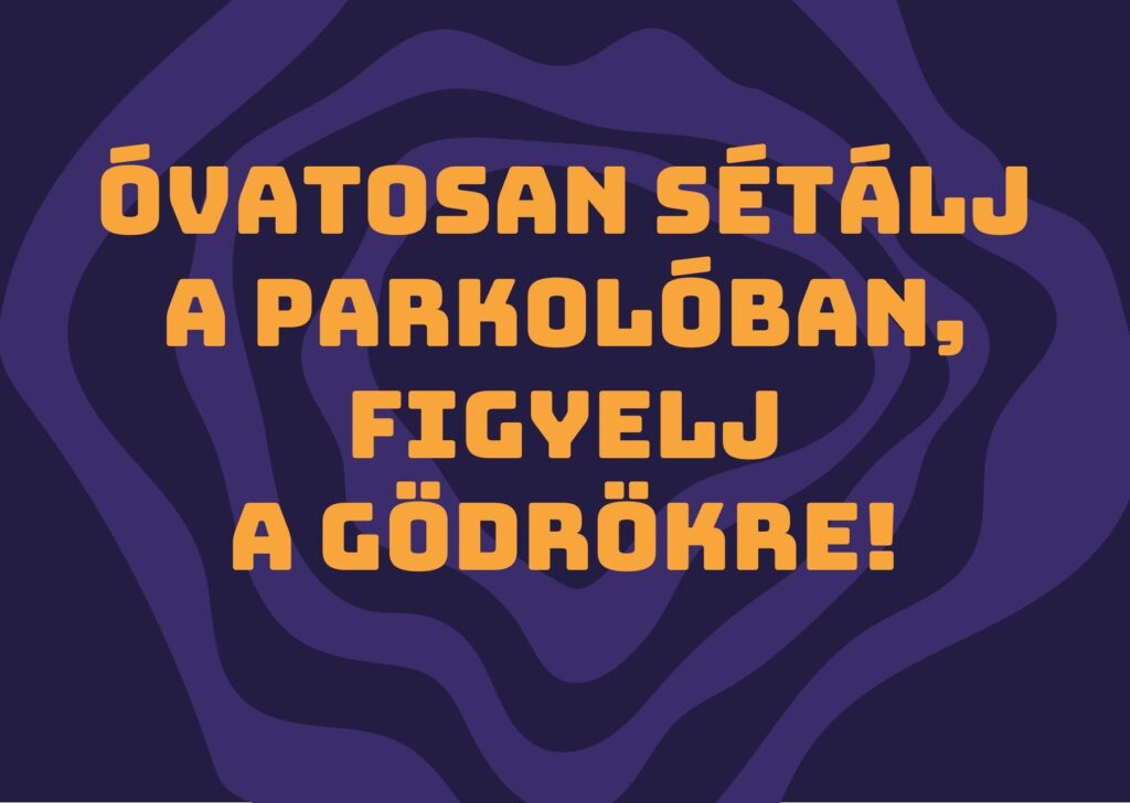 EFOTT 2026 – „Óvatosan sétálj a parkolóban, figyelj a gödrökre!" figyelmeztető tábla